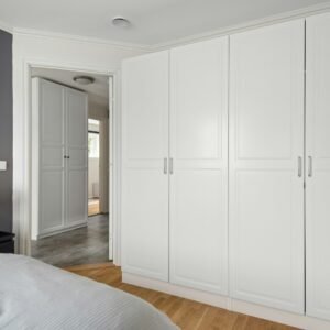 White handleless fitted wardrobe