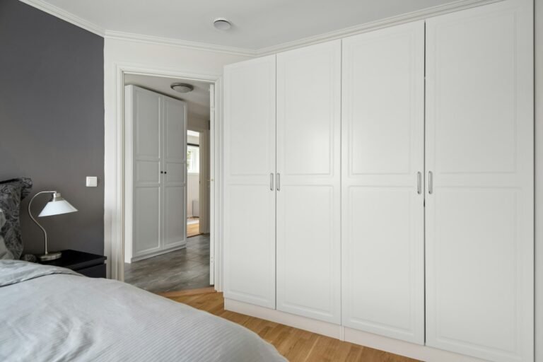 White handleless fitted wardrobe